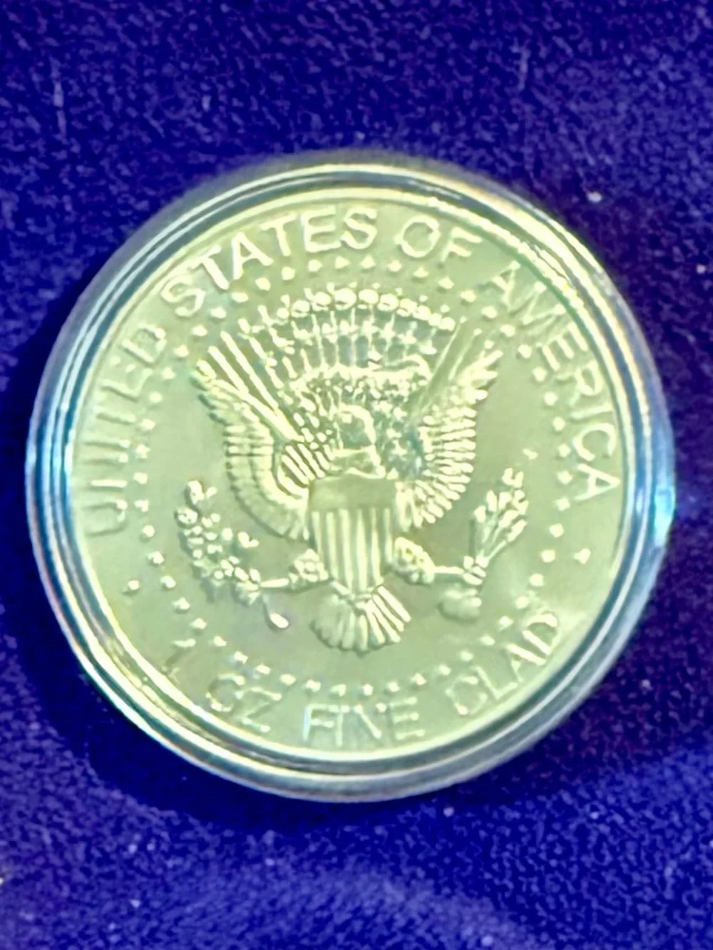 Silver-Tone 1964 Commemorative Coin in Protective Capsule